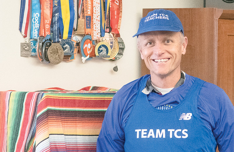 Burlington High School teacher Ryan Olson has run dozens of marathons since his adolescence and still trains for 60 to 70 hours a week. He finished 38th in the virtual TCS New York City Marathon on Saturday.