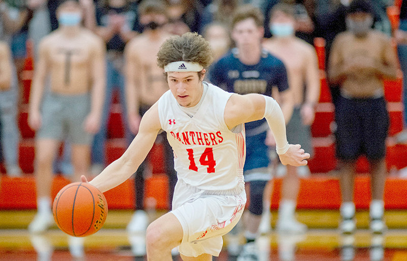 Landon Lengfelder heads to the basket after stealing the ball Saturday in Powell&rsquo;s 60-43 win over Cody. The Panthers are now 2-0 against the Broncs this season following the win.