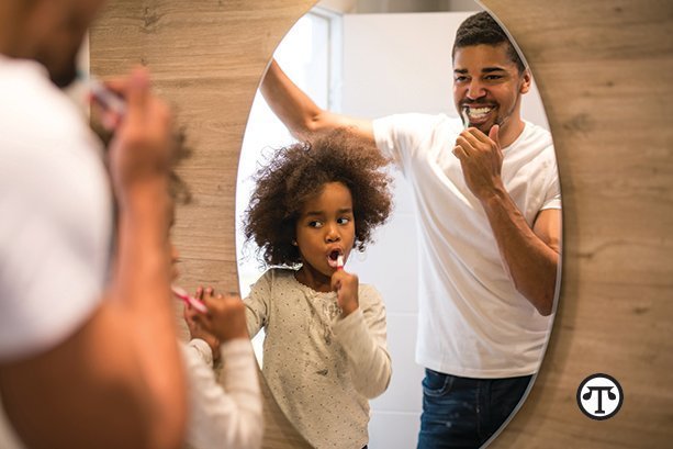 Brush and floss your teeth with your children so they learn good habits.