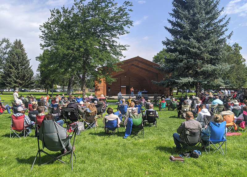 Community members gather at the Washington Park bandshell for the annual &lsquo;Worship in the Park&rsquo; service in August. City of Powell leaders are discussing a proposal that could require developers to contribute more money for parks when subdivisions are annexed into the city.