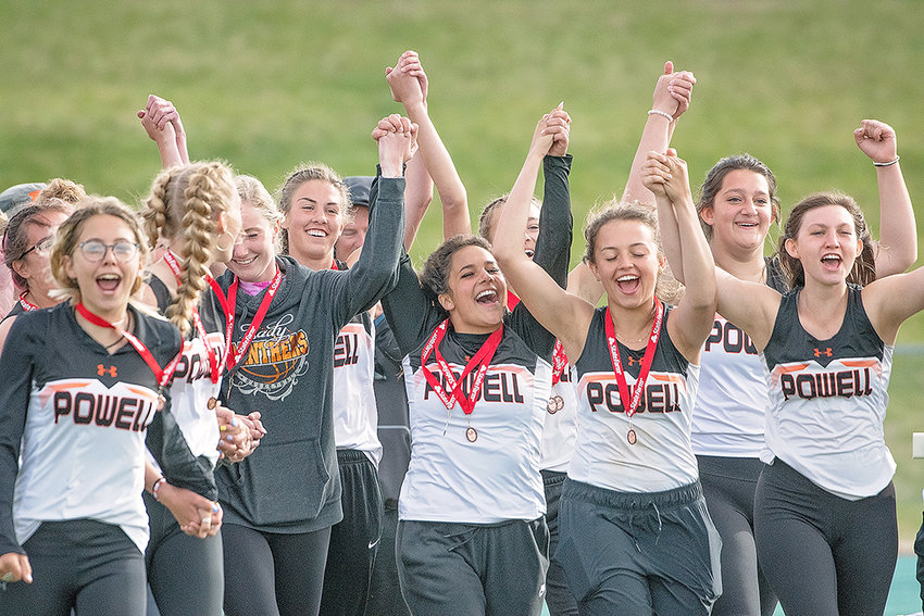 Powell High School girls&rsquo; track and field athletes celebrate after winning the 3A state championship. The Panthers recorded 105 team points and finished well ahead of second-place Buffalo, which posted 71.