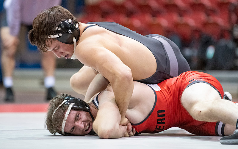 Ryker Blackburn works to turn his opponent during an early season dual with Western Wyoming. Blackburn, along with teammate Gus Harrison, advanced to the NJCAA National Championships after placing in the top two at the Plains District Championships on Saturday.