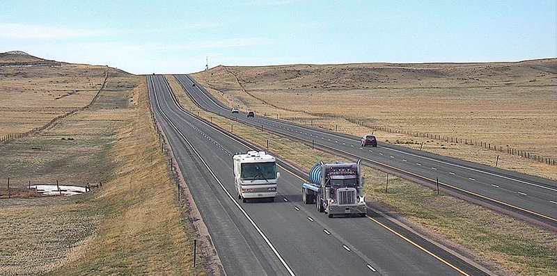 Traffic passes along I-25 north of Chugwater on Monday afternoon. A new federal program will help install charging stations and other electric vehicle infrastructure along Wyoming&rsquo;s highways &mdash; starting with interstates like I-25, but eventually spreading across the state. The Wyoming Department of Transportation is seeking input on the program, including at an upcoming meeting in Cody.