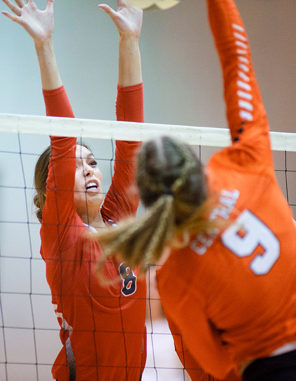 NWC sophomore Emily Baumstarck goes for a block during the Trappers match against Central Wyoming in October.