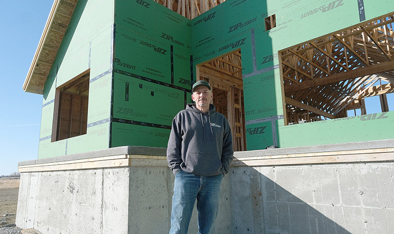 Scott Brown, owner of Scott Brown Construction, stands in front of a house he&rsquo;s building noth of Powell. He has been working in home construction in Powell since he moved here in 1992. The COVID-19 pandemic has created a number of challenges as prices and delivery times grow.