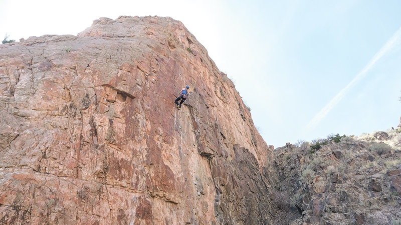 Alicia Hines makes her way up Black Wall, a route at The Island climbing spot just outside of Cody.