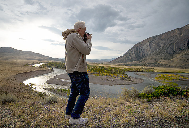 Larry Porter photographs the Clarks Fork River on a recent visit as it runs through the canyon near Clark. Park County is updating its Land Use Plan, starting with public meetings in Powell June 20.