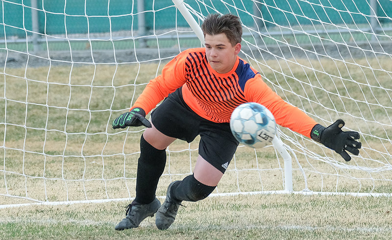 Ryan Rivas dives for a save during the Powell Middle School soccer season. The middle school approved the soccer squad as an official team and sixth graders had three sporting options approved Tuesday night by the Park County School District 1 Board of Trustees.