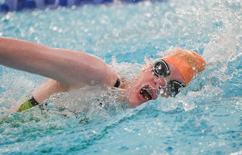 Baylee Brence comes up for a breath during the 100 freestyle at the Banana Split Sprint in Powell on June 23.