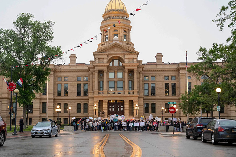 Pro-choice activists gather in front of the Capitol building in Cheyenne on June 30.