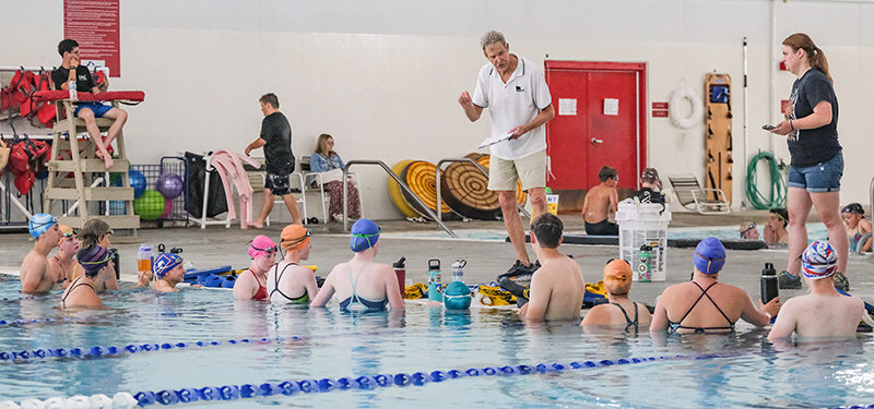 PHS girls&rsquo; head swimming coach Bob Smartt and assistant coach Bailey Jackson instructs Panther swimmers during a session on Tuesday.