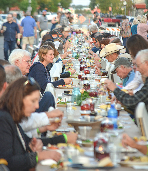 Dining in the street made for an enjoyable evening in 2019, the last year of the Farm to Table Dinner. Weather cooperating, the Homesteader Days weekend will lead off with another street-side outing Friday. In the event of inclement weather, the Farm to Table Dinner will move inside at the fairgrounds.