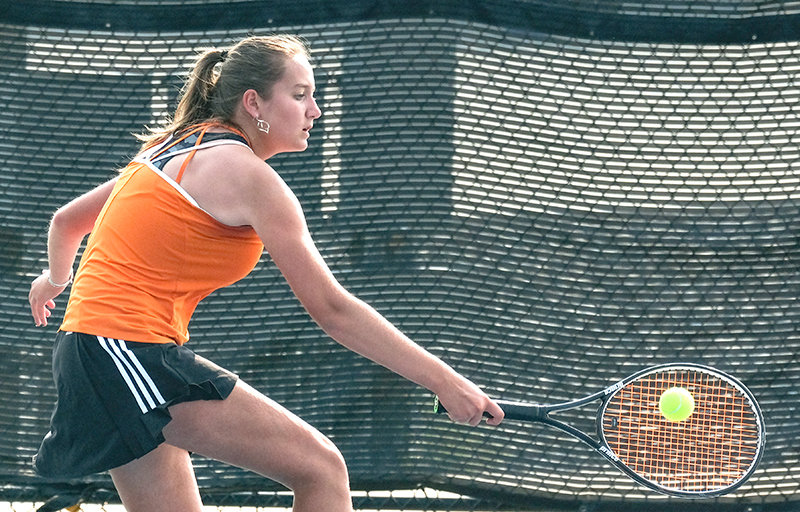 No. 2 singles player Lachelle Lee stretches out to return a ball during the Panthers&rsquo; matches against Cody on Monday.