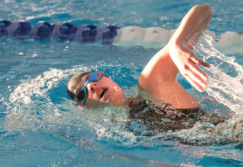 Emma Sapp fights her way into the sun during the 500 freestyle in a dual against Cody on Tuesday.