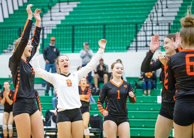 Addy Thorington, Alexa Richardson, Stevee Walsh, Waycee Harvey and Gretel Opps celebrate a point during the Panthers&rsquo; match against Lander on Saturday.