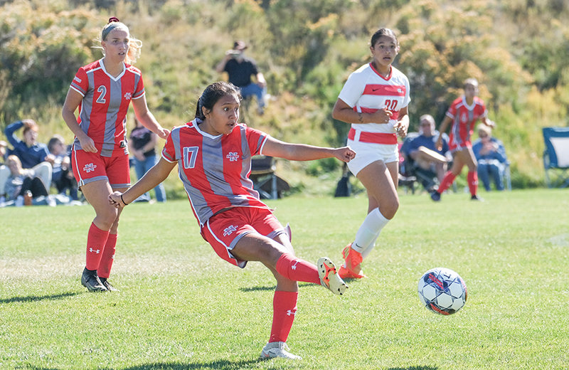 Alexzia Garcia plays a ball through the midfield for the Trappers during their match against Casper College on Saturday.