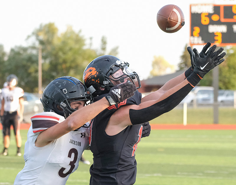 Trey Stenerson reaches out to try and collect a pass during the Panthers 17-14 loss to Jackson on Friday.