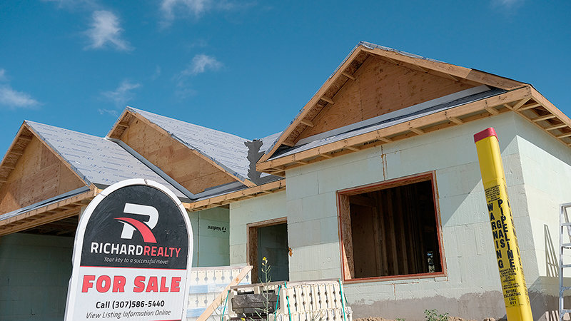 A house is listed for sale in the Cottonwood Village subdivision above North Clark Street as it is being built. Building permits for single family homes have been steady while real estate in the Powell area has slowed after a spike in interest in 2021.