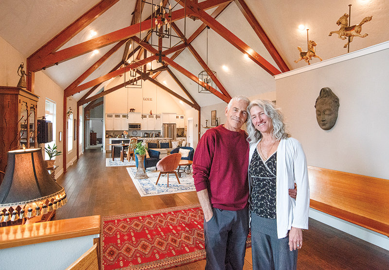 David Bryan and Shelly Graham show off their great room, the former sanctuary at the Immanuel Lutheran Church. The building is now the home of the couple&rsquo;s business pursuits, including a broadcasting studio, a doctor&rsquo;s office and a yoga studio.