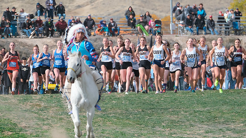 Kenna Jacobsen, Audrey Johnson, Brynn Hillman, Kinley Cooley, Jordan Black and Megan Jacobsen (Melissa Merritt not pictured) race out from the starting line at the Wyoming high school state cross country championships on Saturday in Ethete.