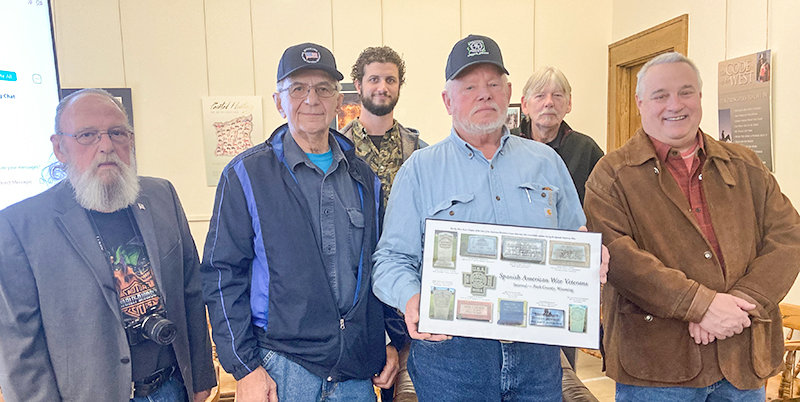 The Big Horn Basin chapter of Sons of the American Revolution presented a plaque to the Park County Commissioners recently honoring Spanish-American War veterans who were buried in Park County. The group includes John Allen (from left), Keith Francik, Jake Dewilde, Walt Hartung, Jerry Behrens, Mike Boyer. Not pictured is Robert Stevens.