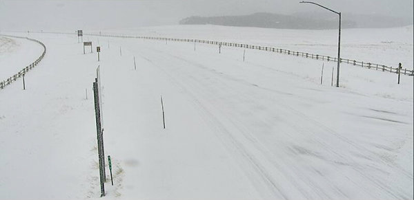 A snowy photograph from a WYDOT webcam Nov. 14 looking south of Burgess Junction, which is scheduled to close for the season Monday.