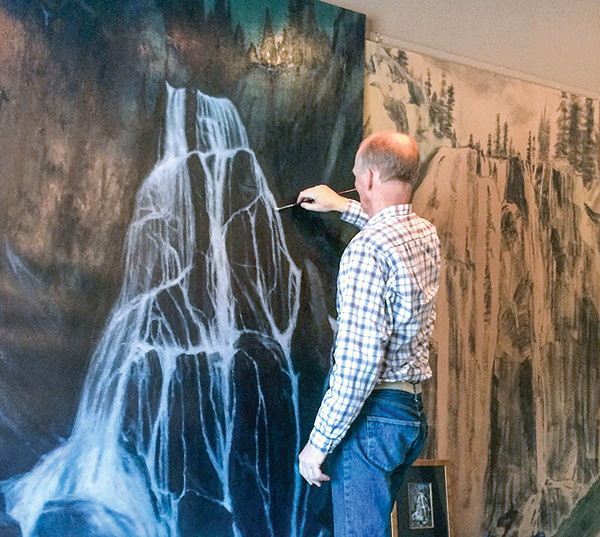 Cody artist M.C. Poulsen, shown here painting one of the works in his Yellowstone waterfalls series, leads &lsquo;Painting with Poulsen&rsquo; Date Night at the Center of the West on Dec. 1.
