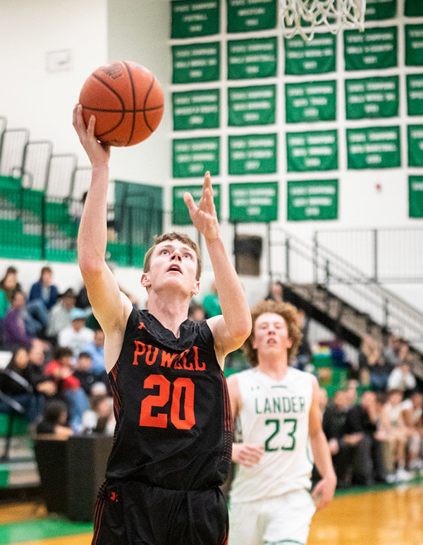 Jace Hyde finishes a layup on the fast break during the Panthers game on Thursday. Powell played three overtime games over three days to open the season.
