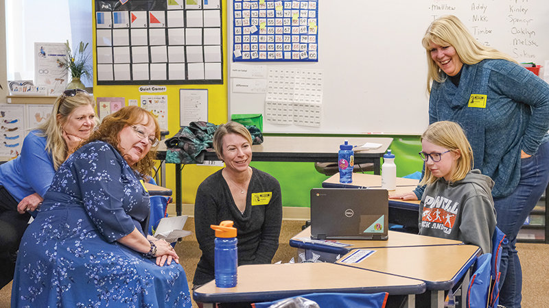 Local authors visited Southside Elementary School&rsquo;s writing club on Dec. 6. to listen to students writing. From the left, Teacher Kaurine Auer-Takos, Linda Rae Sande, Sara Vanduska-Frazier, student Beth Black and Tam DeRudder Jackson.