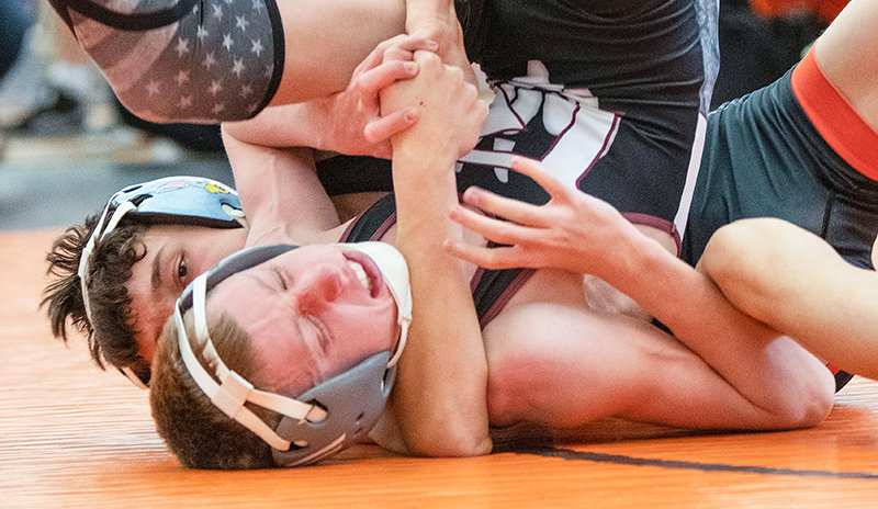 Gabriel Whiting takes down an opponent during the Powell Invite in December. Whiting took third at the Bozeman LeProwse tournament over the weekend.