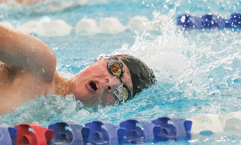 Will Fuller leads off the 400 free relay for the Panthers during the Gene Dozah Invitational on Saturday in Powell.