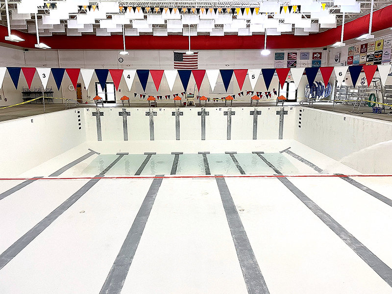 The Powell Aquatic Center lap pool&rsquo;s fading paint &mdash; pictured during a previous cleaning &mdash; will get a fresh coat this spring. On Monday, the Powell City Council hired a Billings company to do the job.