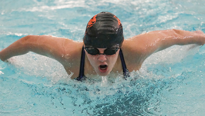Kaitlin Diver rises out of the water during the Winter Fiesta on Jan. 15 in Powell. Diver and 11 other swimmers have qualified for the winter state finals in February in Laramie.