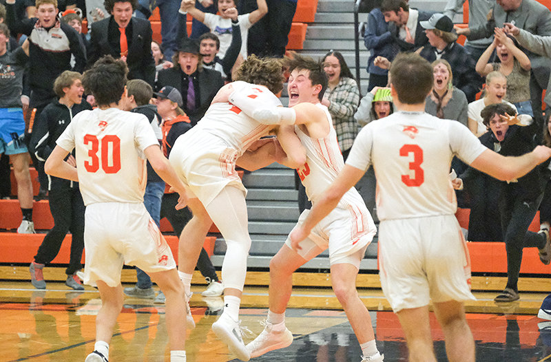 Brock Johnson and Jhett Schwahn celebrate after Johnson&rsquo;s game winner while Gunnar Erickson and Marshall Lewis run to join in after the Panther&rsquo;s dramatic win on Friday.