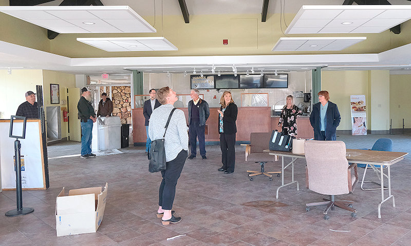 Northwest College President Lisa Watson helped lead a tour of the soon-to-be-demolished student center for board trustees Feb. 13 prior to the board meeting. The decades-old building will be replaced by a new student center in an estimated 18 months.