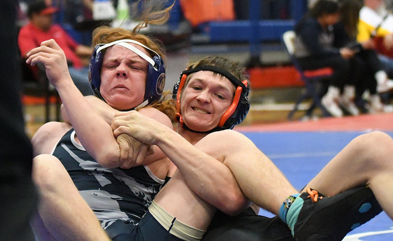 Vinny Timmons, right, battled Cody&rsquo;s Owen Foley in the consolation rounds and placed seventh at the 3A West Regional tournament. He will be heading back to the state tournament in Casper this weekend.