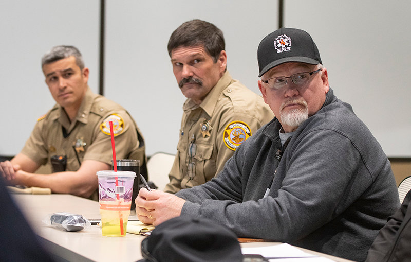 From left, Park County Undersheriff Andy Varian, Park County Sheriff Darrell Steward and Scott Bagnell, emergency medical services and emergency room manager, attend the mass casualty tabletop training session at Northwest College on Monday morning.