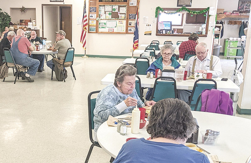 Seniors enjoy lunch at the Powell Senior Center on March 15. The nonprofit&rsquo;s costs have been rising while the center has been getting busier, serving an average of 178 meals per day in February.
