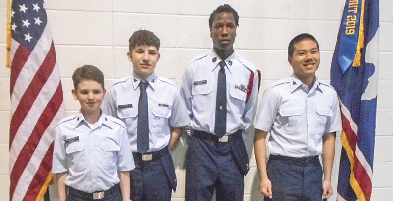 Many Civil Air Patrol members earned promotions this year. From the left are, C/Amn Troy Hoover, C/A1C Christopher Blutt, C/MSgt Adam Swaney and C/Amn Phu Nguyen. Not pictured is C/A1C Austin Fenwick.