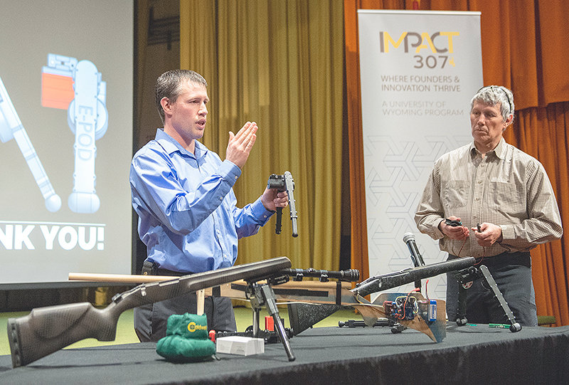 Brandon and Rob Christiansen make their pitch Thursday evening for their Point Blank Tech electronic bipod during the Impact Park County&rsquo;s first annual Start-Up Challenge Pitch Night at the Coe Auditorium in the Buffalo Bill Center of the West. The company was awarded $4,000, including a $1,000 for the audience choice award.