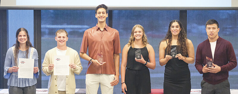 Northwest Trapper athletes pose with their awards after their end of year banquet on May 2. From left: Anna Knight, Brash Emery, Juan Pablo Camargo, Elsa Clark, Darla Hernandez and Aziz Fayzullaev.
