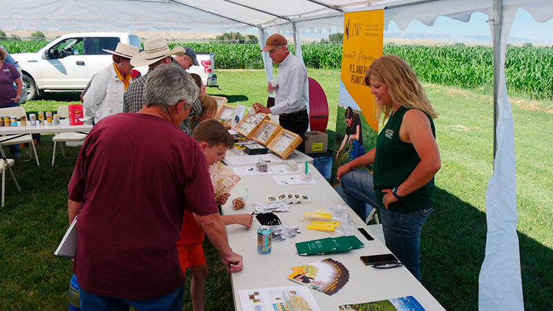 UW researchers interact with participants at a 2022 field day hosted by the Powell Research and Extension Center.
