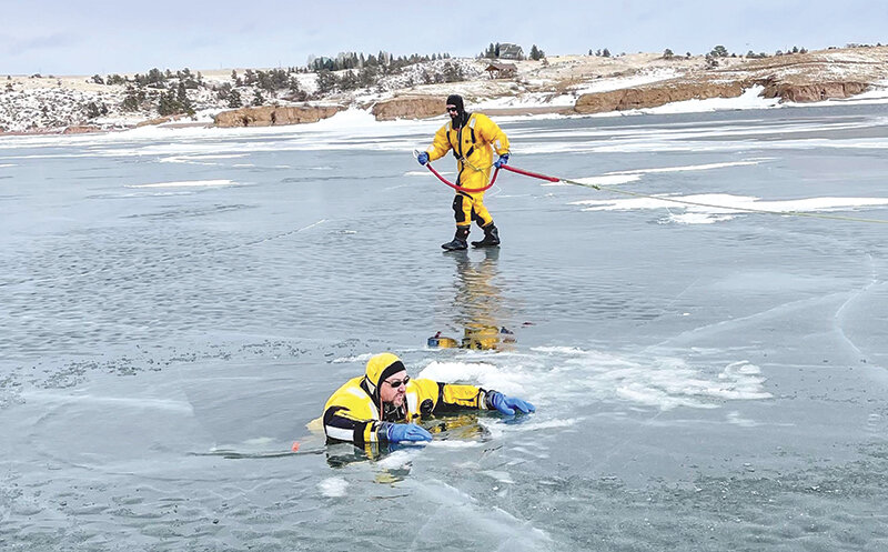 Wyoming State Park Rangers hold ice rescue training.