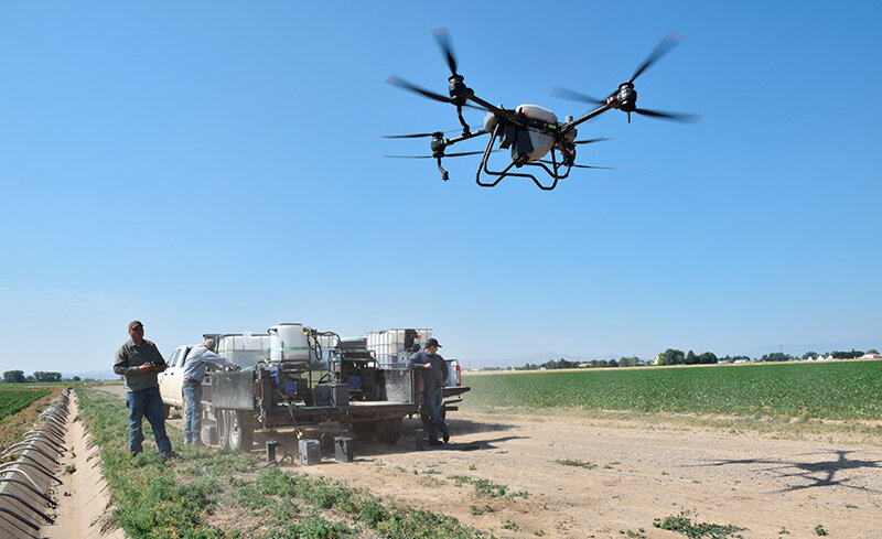 Western Wings Drone Service pilot Jake Masters takes off to spray local farmer Jared Snell&rsquo;s field in July. Western Wings Drone Service has been operating since June and has contracted with Simplot to spray fields in the area.