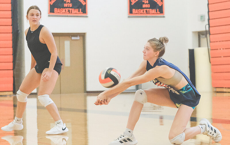 Kodee Asay (right) gets under a ball during practice last Thursday alongside Alexa Richardson. The Panther volleyball team opens the season on the road at the Lander Invitational this Friday and Saturday.