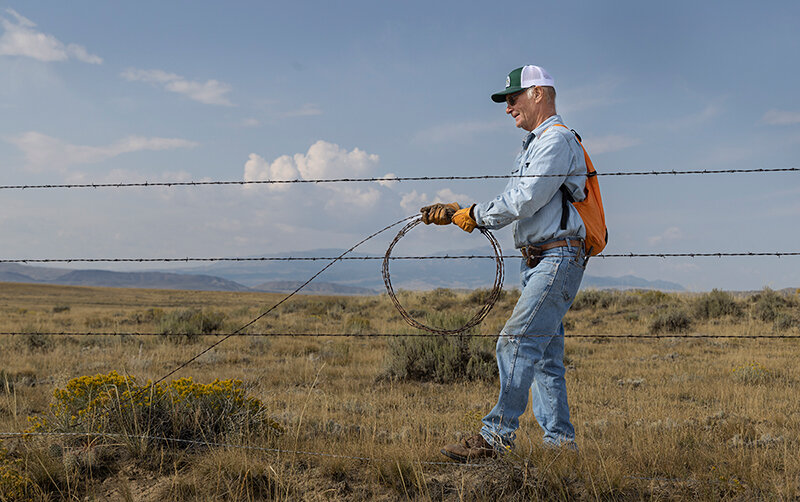 Volunteer Bruce Fauskee, of Powell, works on a previous project for the Absaroka Fence Initiative. The group aims to ensure fences are functional for livestock management and wildlife movement across the landscape through on the ground projects, public workdays and outreach to the community.