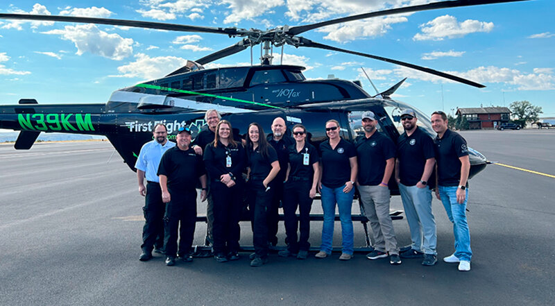 The First Flight team at Cody Regional Health stands in front of the helicopter that is crucial to the start of the hospital&rsquo;s medical flight program, which launches Oct. 1.