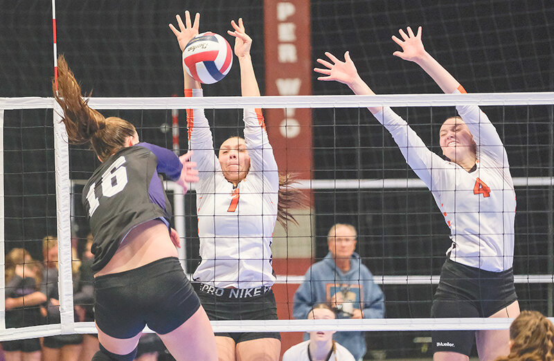 Catelynn Floy (left) and Saige Kidd rise up to get a block against Mountain View in the championship match Saturday. Floy and Kidd will be two of the top returners for the Panthers next season after a second place finish this year.