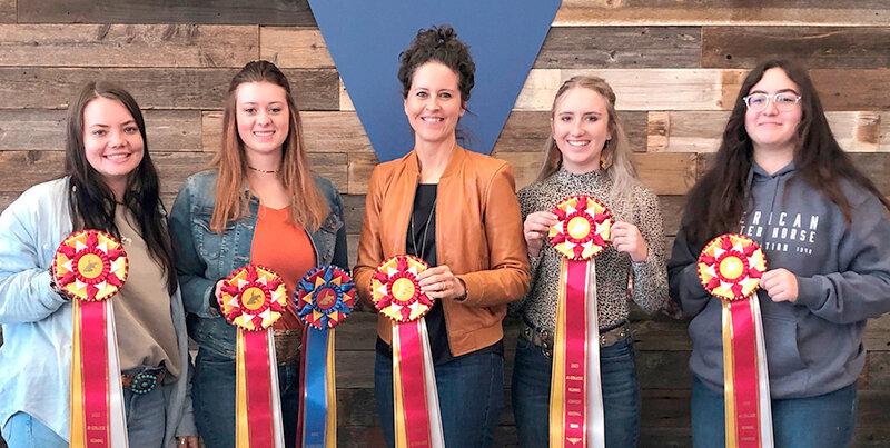 From left, the Northwest College equine judging team (from left) Olivia Cottam, Jasmine Brinley, Pamila Thiel, Adelene Royes and Avalon Ponce display their awards garnered at the AQHA World Show NHJTCA Reining Contest.