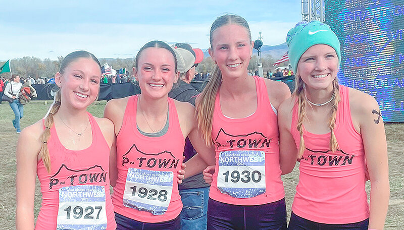 Four runners represented Powell High School at the Nike Cross Regionals Northwest in Boise, Idaho, earlier this month. The runners posing for a photo at the meet, are from left: Karee Cooley, Kinley Cooley, Kenna Jacobsen and Ashlee Jacobsen.